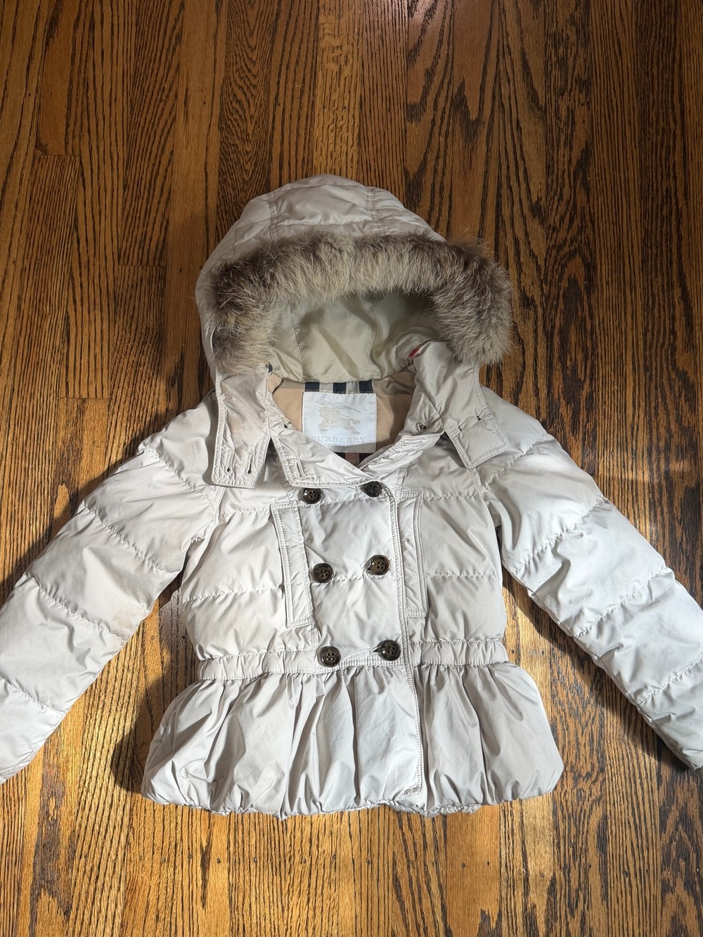 Burberry Kids cream peplum puffer coat with a fur hood, size 7Y